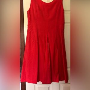 Women’s  reddish / orange color dress flair style